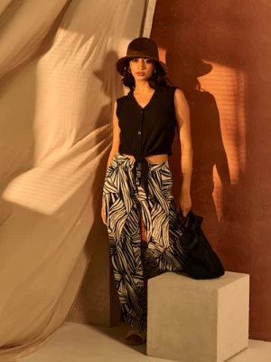 Sinsay - Spodnie wide leg z abstrakcyjnym wzorem - czarny