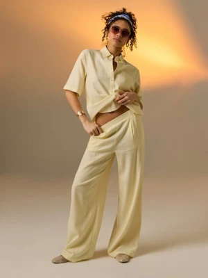 Sinsay - Spodnie wide leg z domieszką lnu - żółty