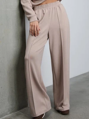 Sinsay - Spodnie wide leg z domieszką wiskozy - beżowy