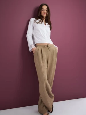 Sinsay - Spodnie wide leg z domieszką wiskozy - beżowy