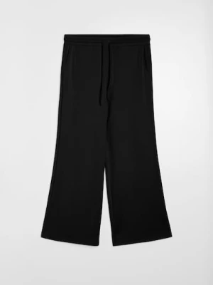 Sinsay - Spodnie wide leg z kieszeniami i domieszką wiskozy, soft touch - czarny