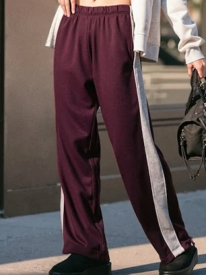 Sinsay - Spodnie wide leg z lampasami - bordowy