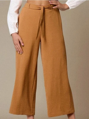 Sinsay - Spodnie wide leg z wiązaniem - żółty