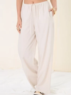 Sinsay - Spodnie wide leg z wiskozą i domieszką lnu - kremowy
