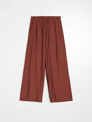 Sinsay - Spodnie wide leg z wiskozą - żółty