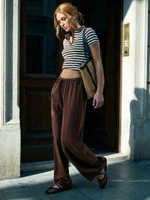 Sinsay - Spodnie wide leg z wiskozą - żółty