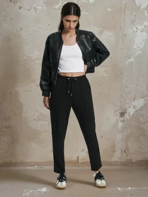 Sinsay - Spodnie z domieszką wiskozy - czarny