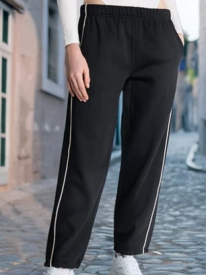 Sinsay - Spodnie z kontrastową lamówką - czarny