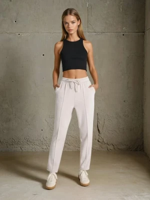 Sinsay - Spodnie z przeszyciami soft touch - kremowy