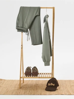 Sinsay - Spodnie z przeszytym kantem - zielony