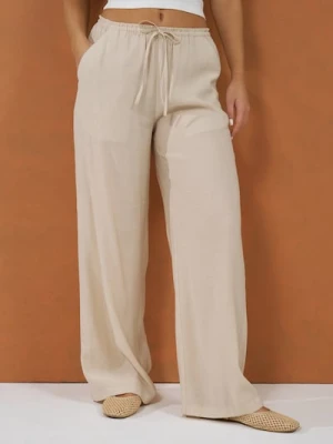 Zdjęcie produktu Sinsay - Spodnie z wiskozą wiązane w talii - beżowy