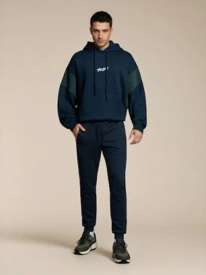 Sinsay - Sportowe spodnie dresowe z przeszyciami - granatowy