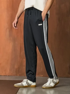 Sinsay - Sportowe spodnie z lampasem - czarny