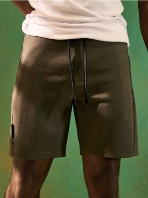 Sinsay - Szorty slim z kiszeniami na zamek - zielony