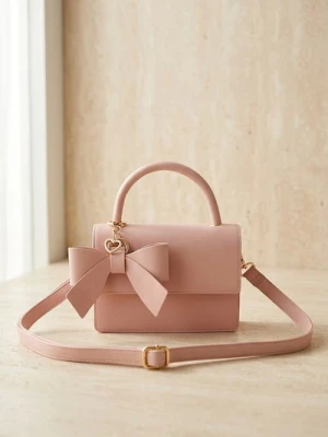Sinsay - Torebka z kokardą i ozdobną zawieszką w kształcie serca - różowy