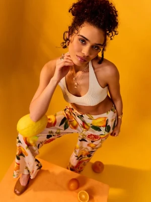 Sinsay - Wiskozowe spodnie wide leg z nadrukiem owocowym - pomarańczowy