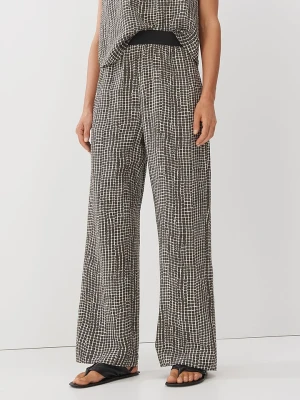 Someday Spodnie w kolorze oliwkowo-białym rozmiar: 36