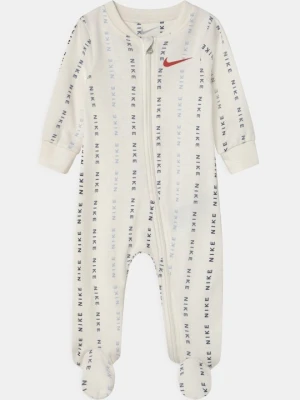 Śpioszki Nike mleczny