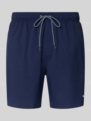 Spodenki kąpielowe z bocznymi kieszeniami i tylną kieszenią zapinaną na zamek błyskawiczny Puma