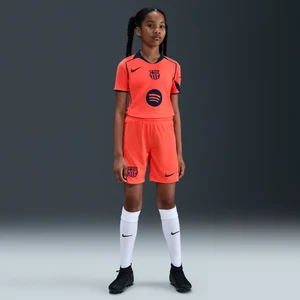 Spodenki piłkarskie dla dużych dzieci Nike Dri-FIT Total 90 FC Barcelona 2025/26 Stadium (wersja trzecia) – replika - Pomarańczowy