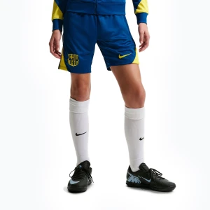 Zdjęcie produktu Spodenki piłkarskie dziecięce Nike FC Barcelona Strike SE Jr gym blue/opti yellow/opti yellow