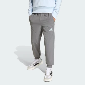SPODNIE ADIDAS BOYS HOODED TECH WOVEN szary