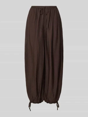 Spodnie balon z mieszanka wiskozy z trokiem przy dole Gina Tricot