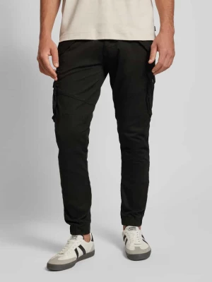 Spodnie cargo o kroju tapered fit z kieszeniami z patką model ‘COMBAT PANT’ alpha industries