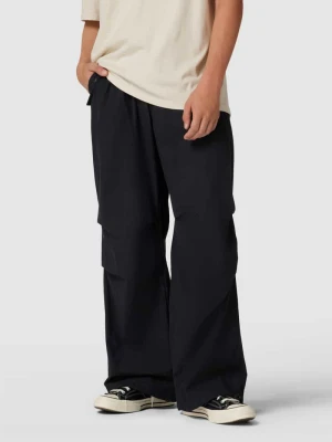 Spodnie cargo z nakładanymi kieszeniami Karl Kani