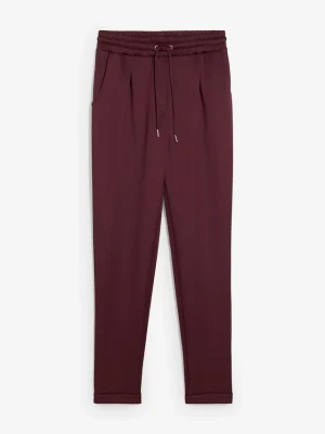 Spodnie chino z materiału scuba BonPrix czerwony
