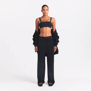 Spodnie damskie z bocznymi zatrzaskami NikeSKIMS Matte Tricot - Czerń