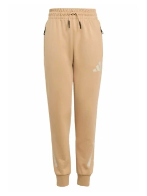 Spodnie dresowe Adidas beżowy