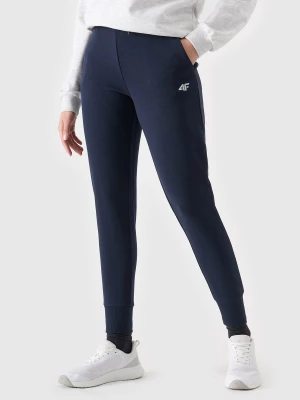 Spodnie dresowe joggery damskie - granatowe 4F