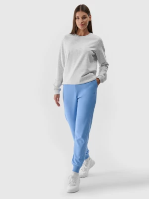 Spodnie dresowe joggery damskie - niebieskie 4F