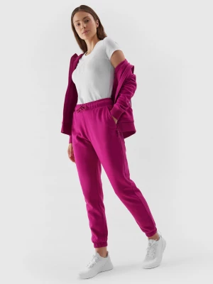 Spodnie dresowe joggery damskie - różowe 4F