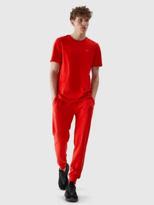 Spodnie dresowe joggery męskie - czerwone 4F