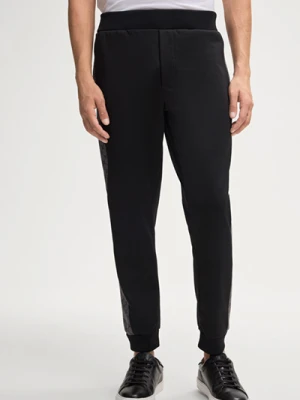 Spodnie dresowe Lonnito w kolorze czarnym z motywem chabru Joop