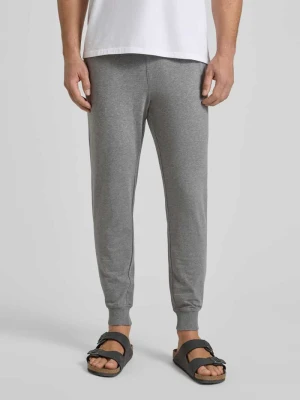 Spodnie dresowe męskie JOOP! Collection;Mieszanka bawełny z dodatkiem streczu;Krój regular fit;Elastyczny pas;Tunel;Długość wewnętrzna nogawki w rozmiarze M: 74