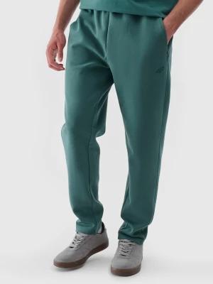 Spodnie dresowe męskie - zielone 4F