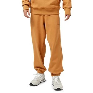 Spodnie dresowe New Balance MP23551TOB - pomarańczowe