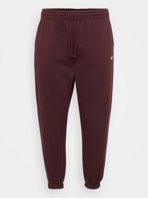 Spodnie dresowe Nike bordowy