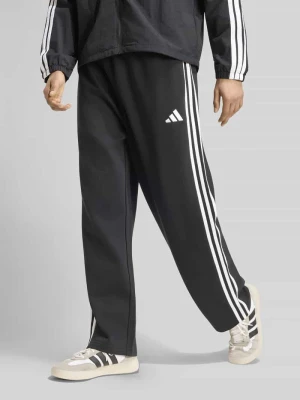 Spodnie dresowe o kroju loose fit z detal z logo Adidas Czarny