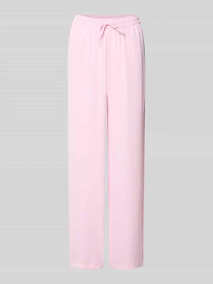 Spodnie dresowe o kroju loose fit z elastycznym pasem i troczkiem JJXX