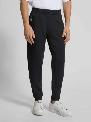Spodnie dresowe o kroju regular fit z aplikacją logo model ‘Train’ EA7 Emporio Armani