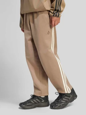 Spodnie dresowe o kroju regular fit z czystej bawełny Adidas Beżowy