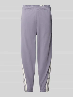 Spodnie dresowe o kroju regular fit z czystej bawełny Adidas Fioletowy