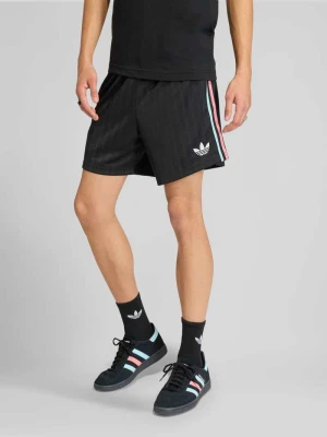 Spodnie dresowe o kroju regular fit z detalem z logo model 'Belgien 26' adidas Originals