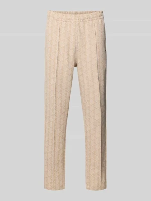 Spodnie dresowe o kroju regular fit z dodatkiem bawełny Lacoste