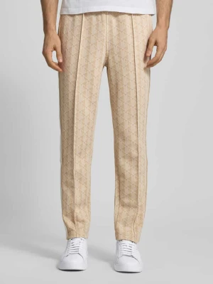 Spodnie dresowe o kroju regular fit z dodatkiem bawełny Lacoste