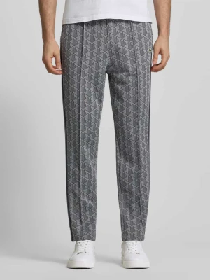 Spodnie dresowe o kroju regular fit z dodatkiem bawełny Lacoste